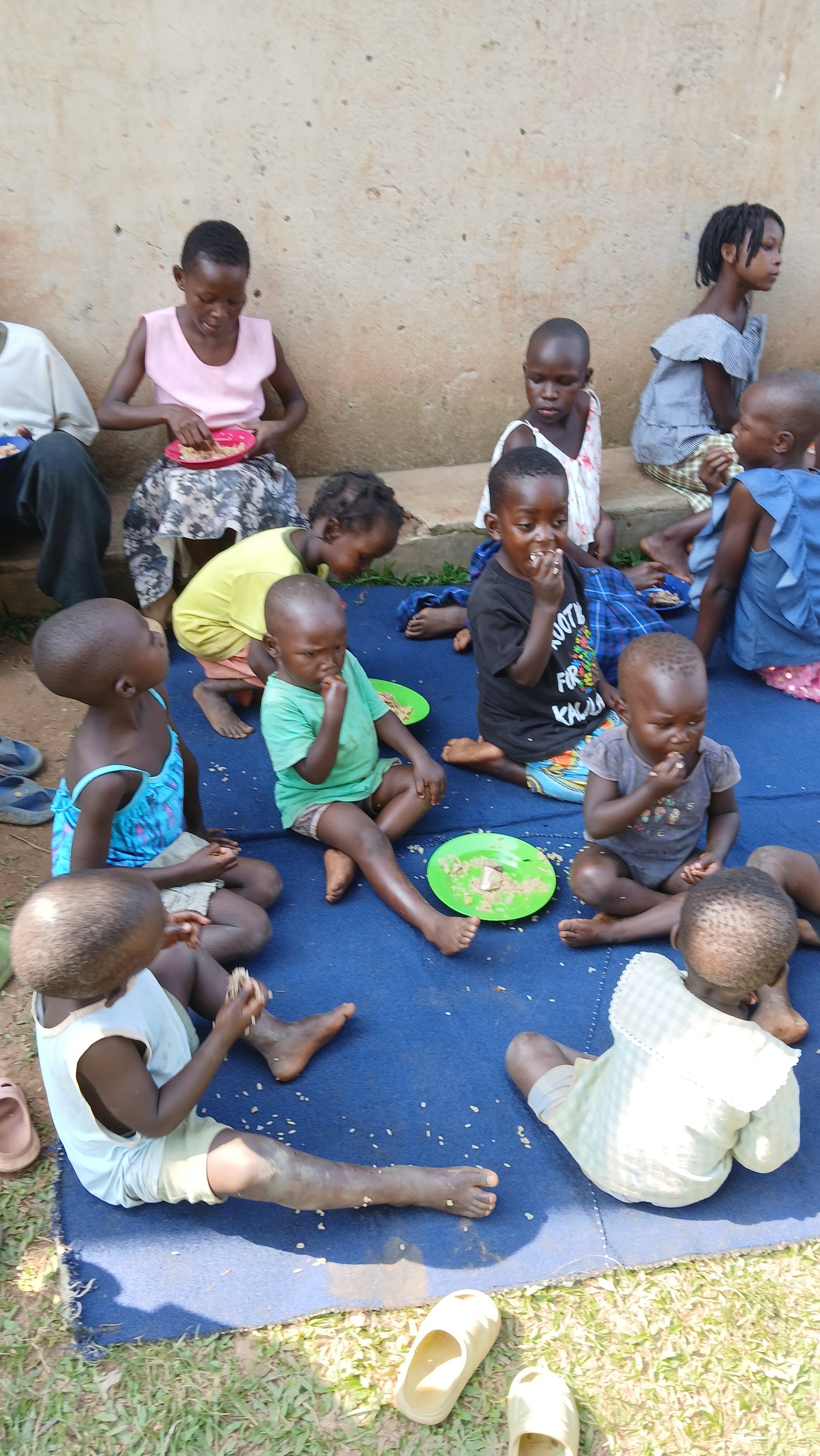 A group of children sharing food