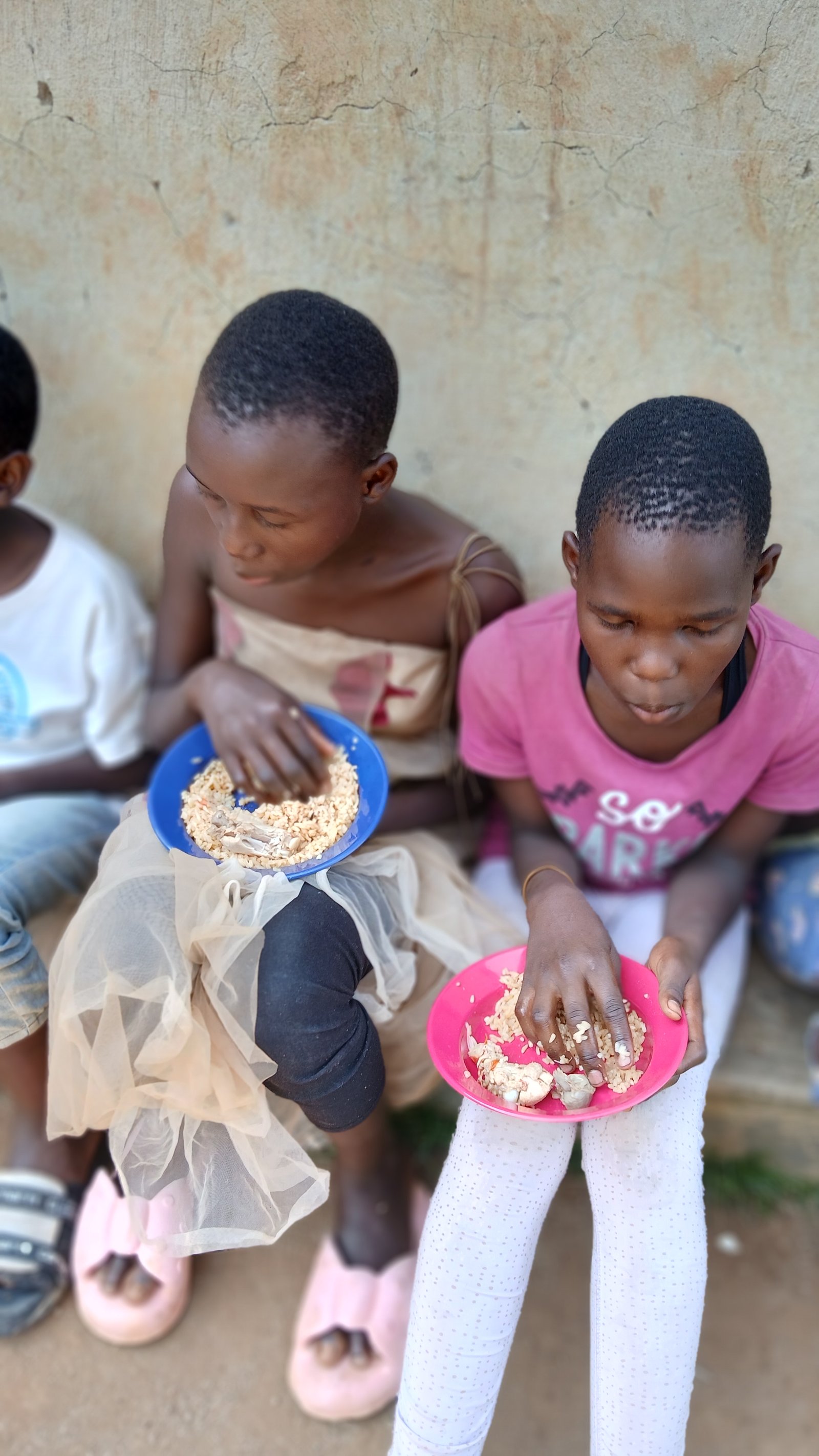 Children eating from their bowls